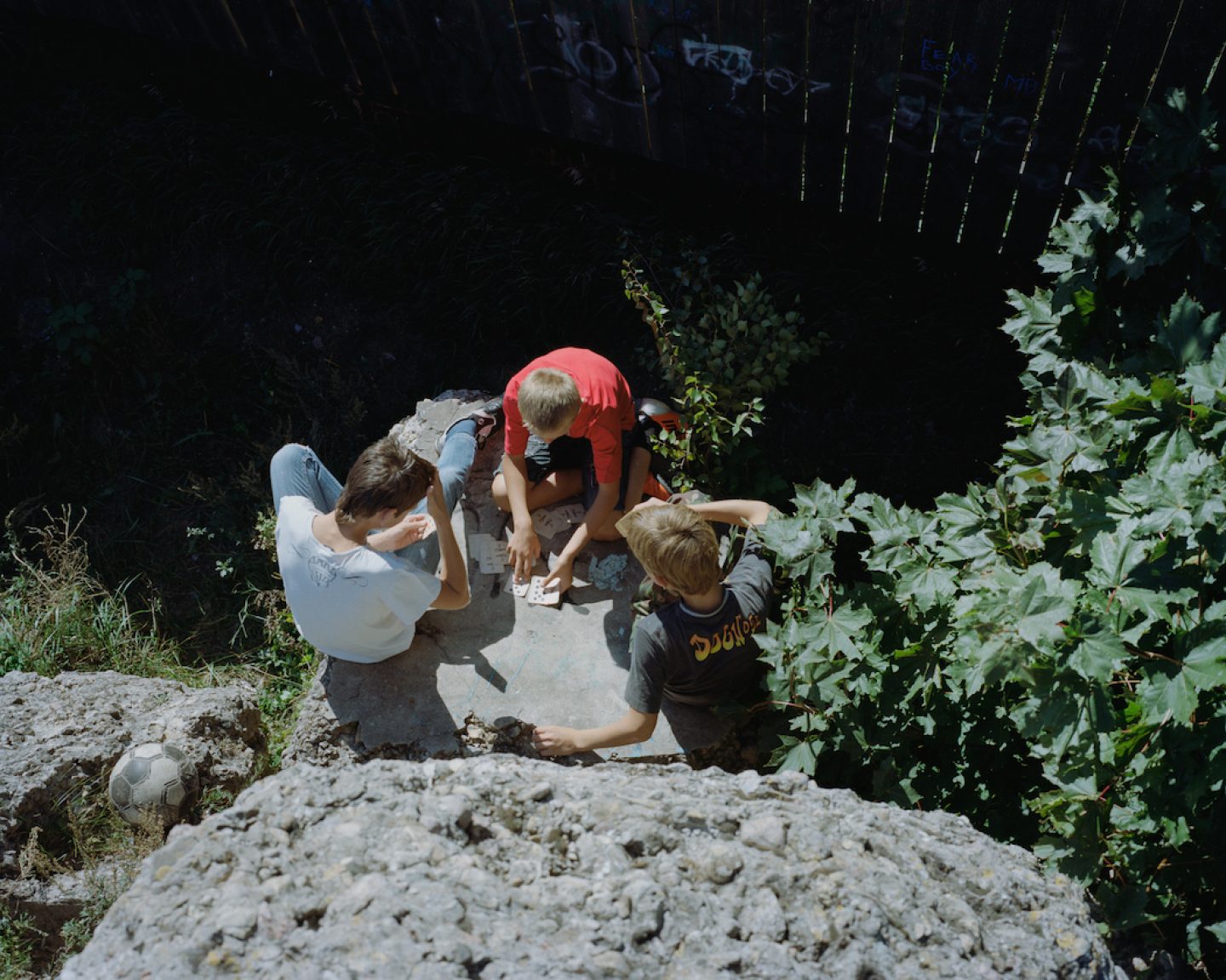 Boys playing cards, Bolderāja, 2012.