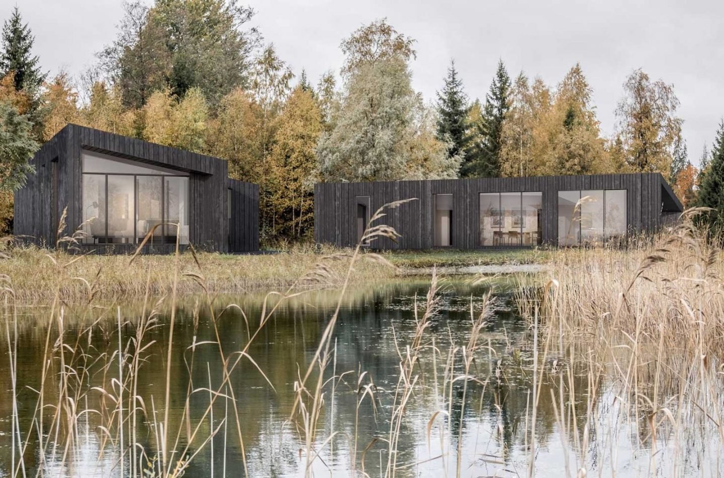 Cute little colorful private real sauna house by the private lake shore in autumn, yellow autumn tree leaves.